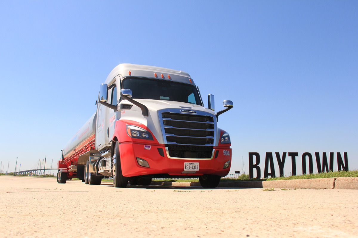 New Coastal Plains Trucking trucks are photographed in Baytown.