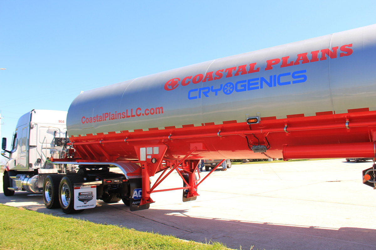 New Coastal Plains Trucking trucks are photographed in Baytown.