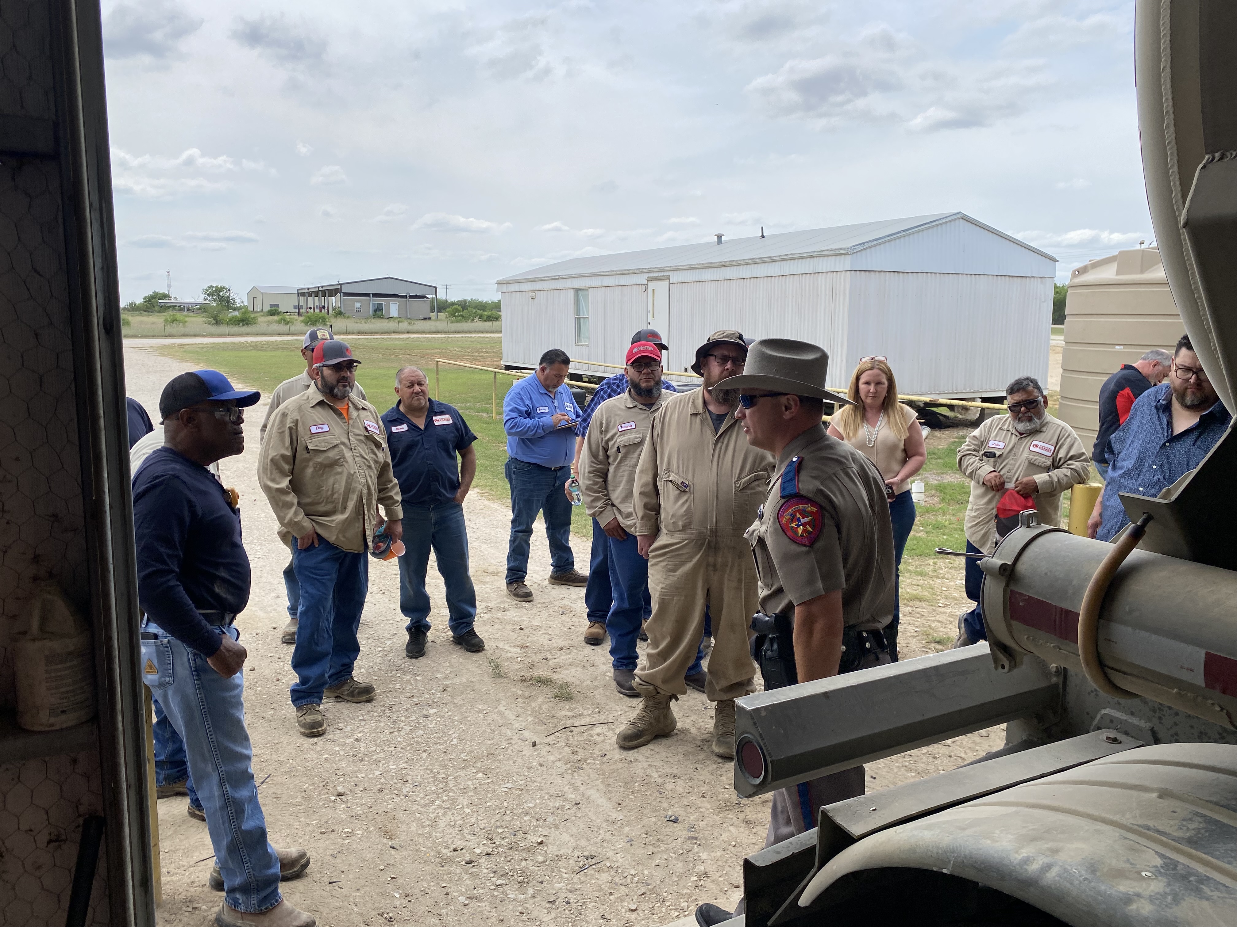 Texas DPS officer speaks to Coastal Plains Trucking team.